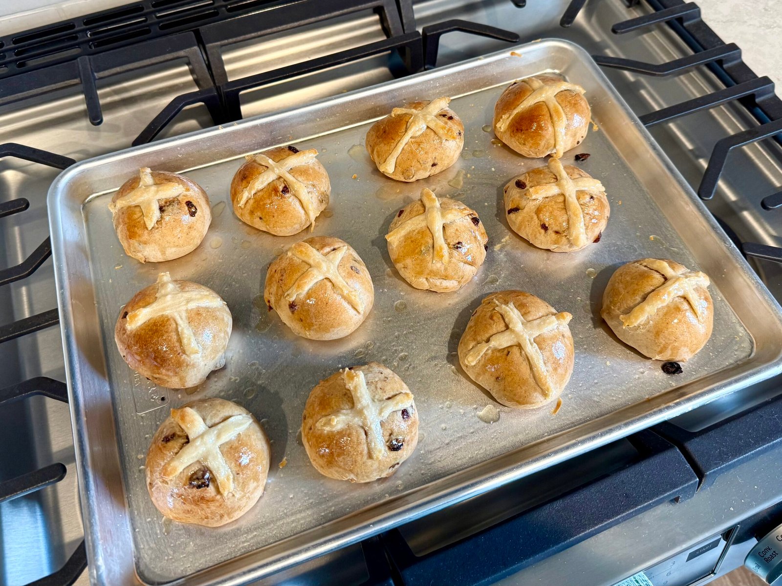 Sourdough hot cross buns topped with a traditional flour cross