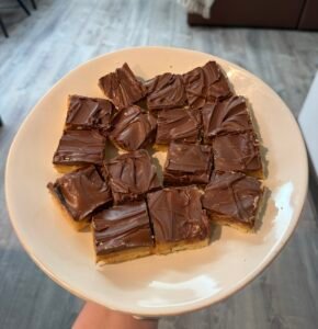 Buttery shortbread layered with thick, chewy caramel and smooth chocolate